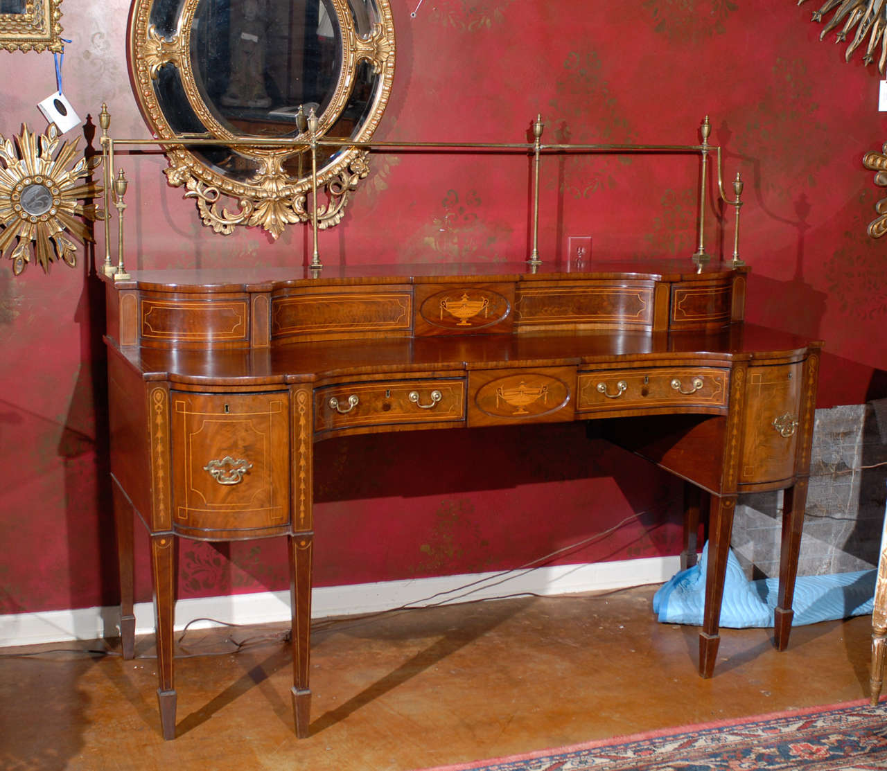 Mahogany Serpentine Sideboard with Brass Gallery