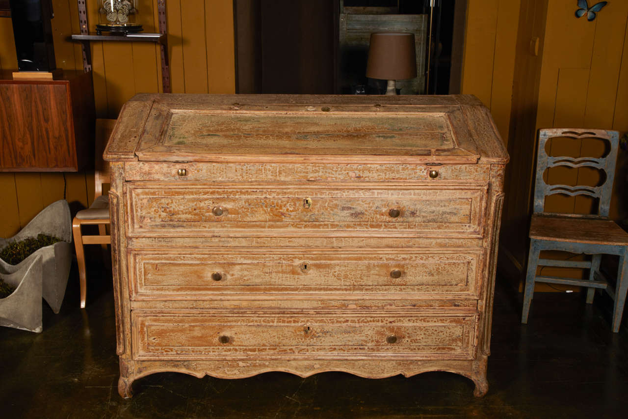 In the pure 18th century style, Louis XV period. Painted wood with a beautifull patina of origin and wonderfull carved details.   
With three drawers and a very well organized top desk.
From South west-part of France near Bordeaux.