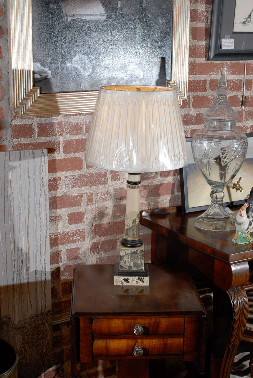 Early 20th Century English tole lamp in cream and black.  Lamp shade sold separately.