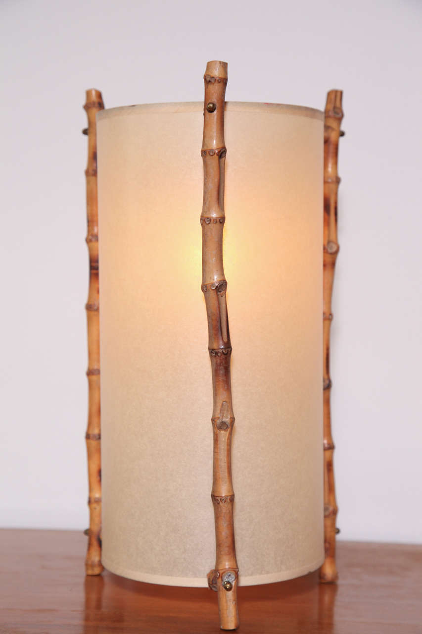 Parchment and bamboo table lamp attributed to Jacques Adnet.
