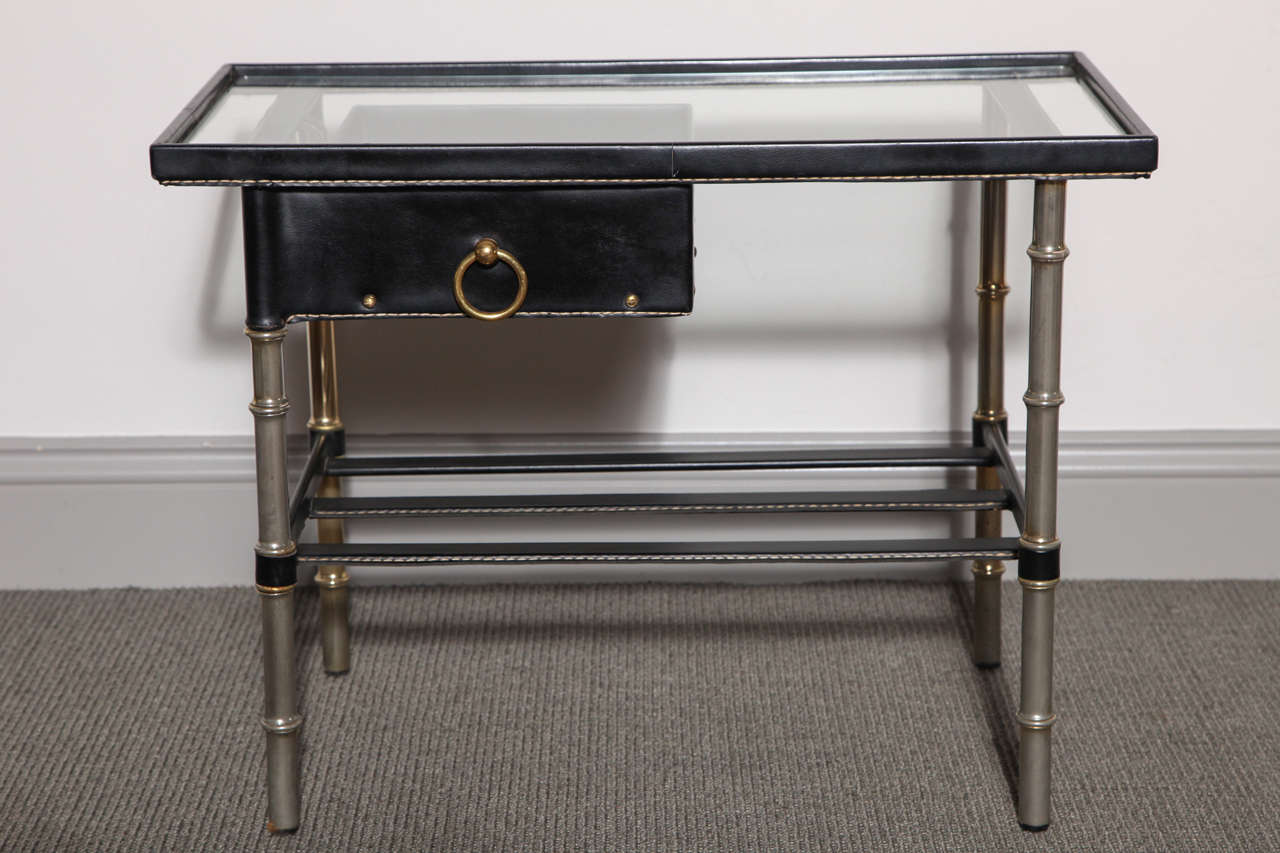 Hand stitched black leather side table with drawer.