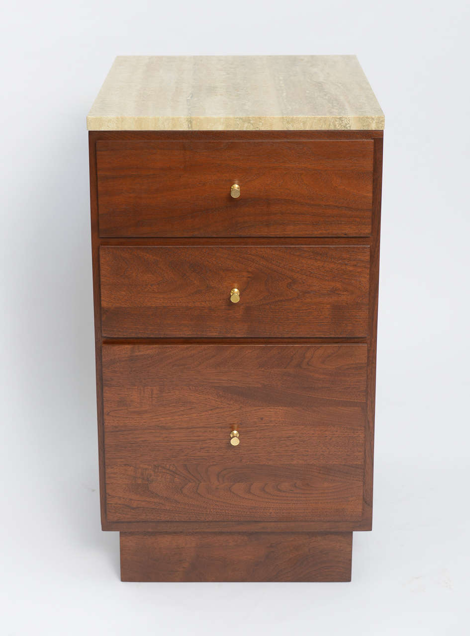 ...SOLD... Crisp and minimalist in style this travertine marble topped Paul McCobb inspired bedside table or nightstand exhibits superior cabinetry, constructed in solid walnut with dovetailed solid oak drawers. Gorgeous travertine top with