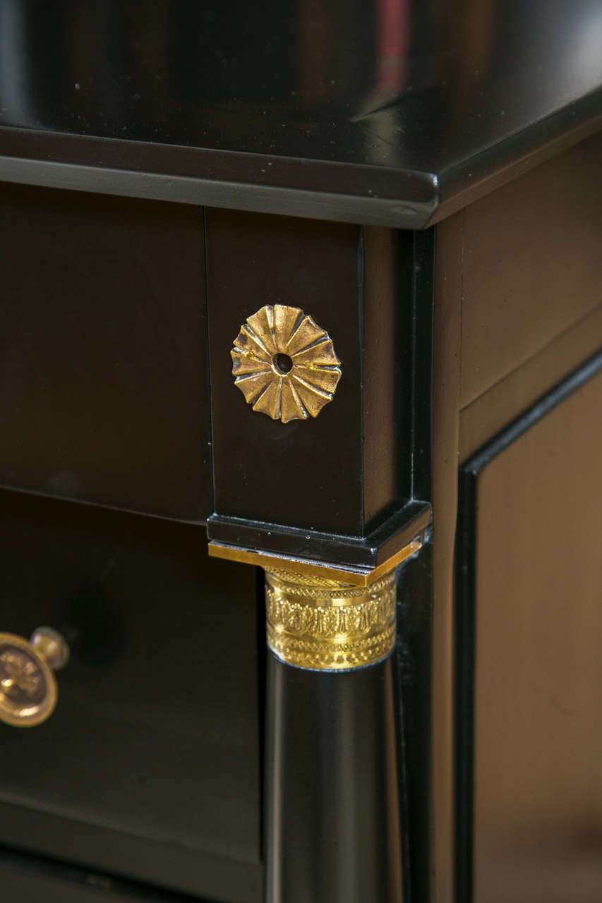 French Empire Style Ebonized Chest of Drawers Decorated with Brass Hardware In Good Condition In Stamford, CT