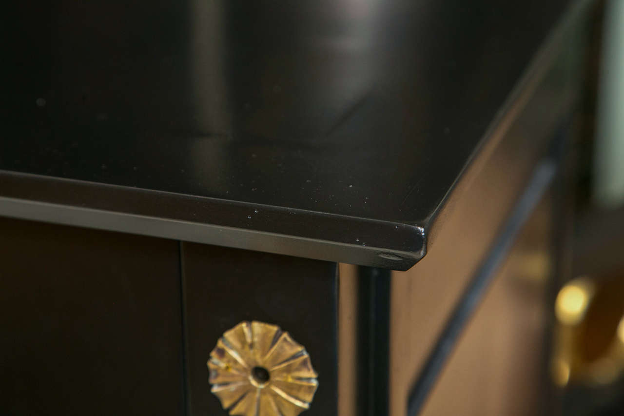 Mid-20th Century French Empire Style Ebonized Chest of Drawers Decorated with Brass Hardware