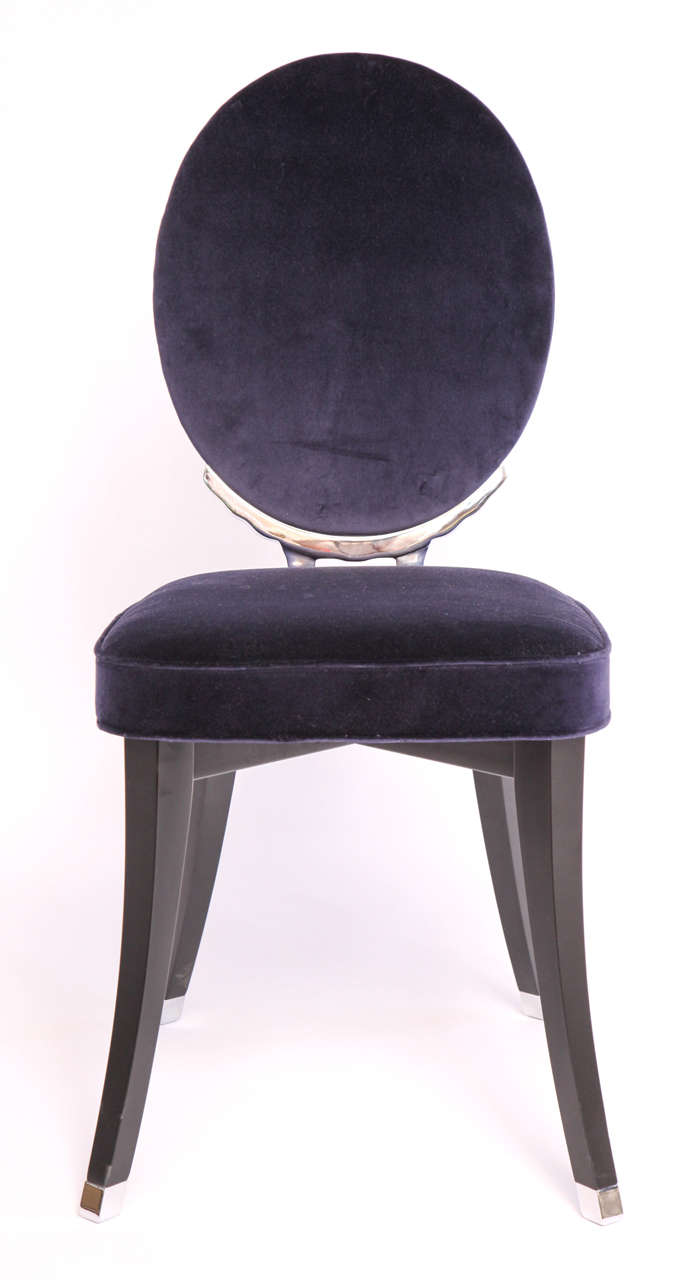 An unfathomably deep sapphire velvet side chair with oval back, newly upholstered. Imagined by the infamous French designer, Jean-Charles de Castelbajac. Who says it can't be at the head of the table?