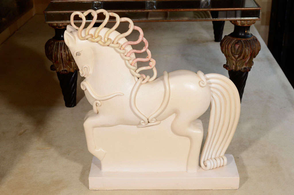 Ceramic horse sculpture by Colette Gueden for Primavera from the last half of the 1930s. The piece is all original and has not been restored anywhere. Mane was originally painted and some color still exists.