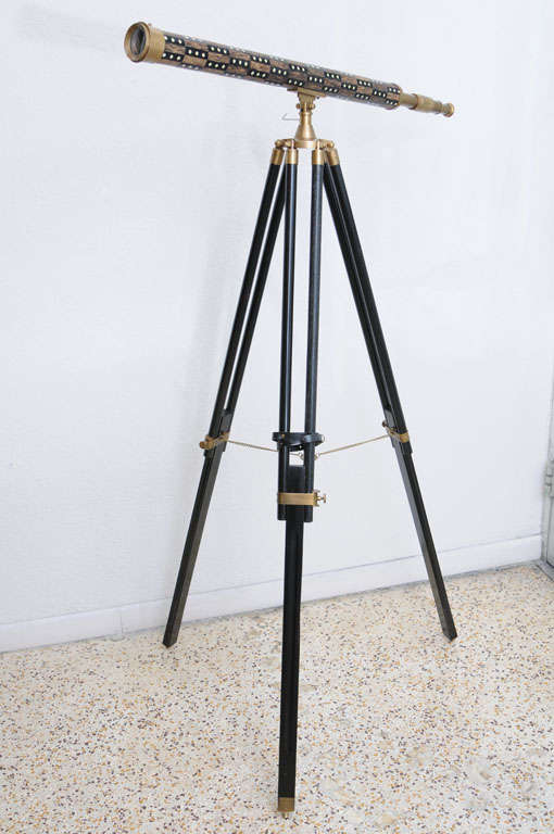 Fabulous vintage telescope mounted on a wood and antique brass tripod.  The scope is made out of antique brass, inlaid horn and wood.
