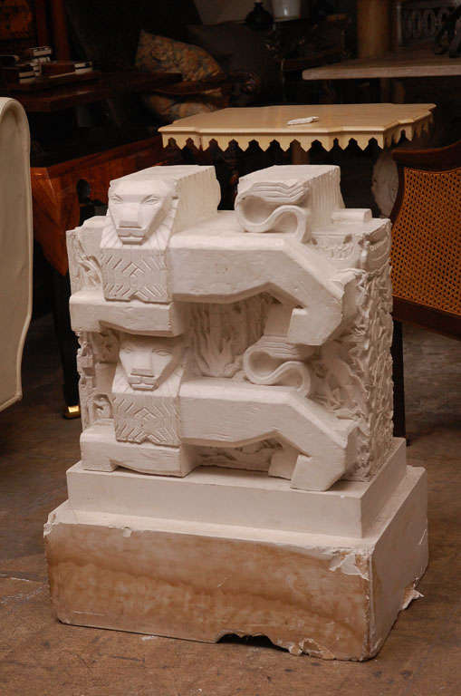 Art Deco Plaster Sculpture of a Pair of Recumbent Lions on the Front and Back as well as Elaborately Detailed Battle and Construction Scenes