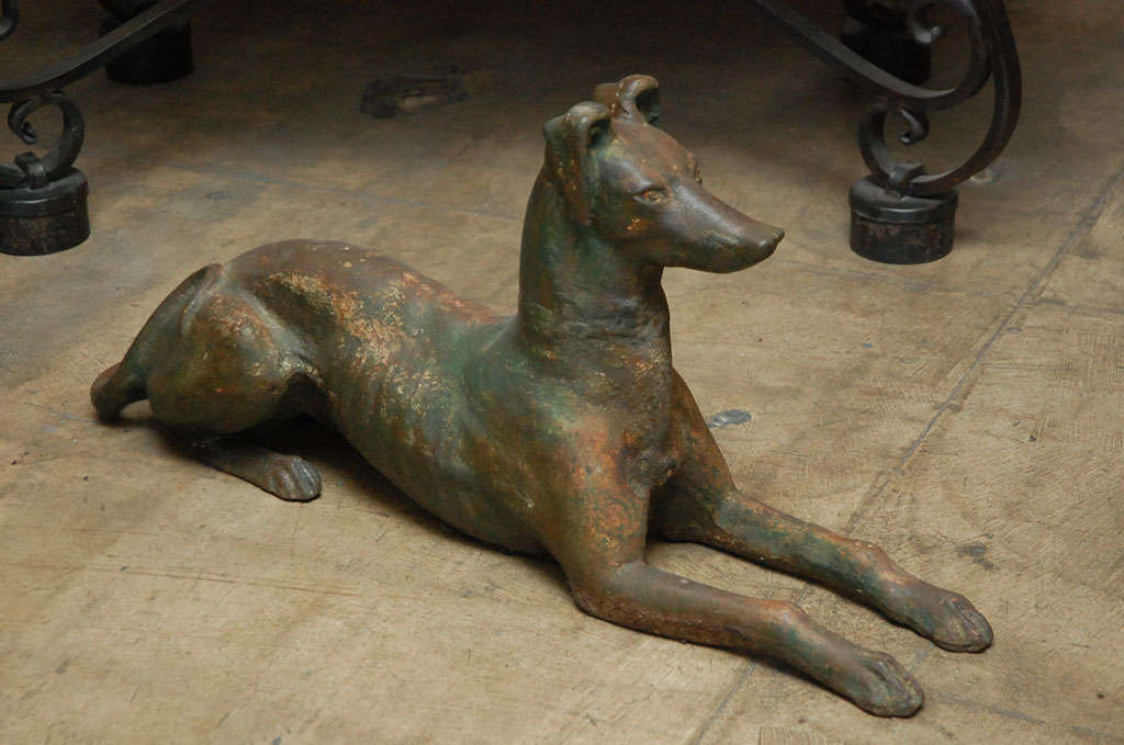 Metal Sculpture of a Sitting Dog