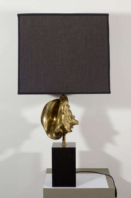 Gilt-bronze conch shell lamp with a black marble base by Maison Charles

Shade is 13.75” square