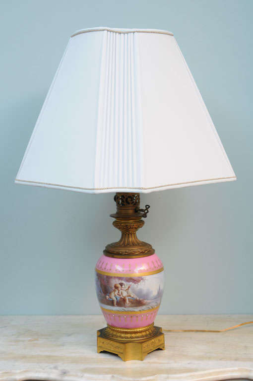 French Pair of Pink Sevres Porcelain Lamps with Cupids, circa 1850 For Sale