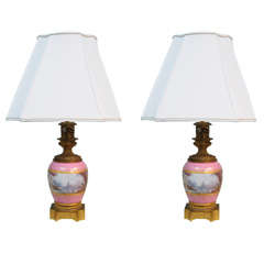 Pair of Pink Sevres Porcelain Lamps with Cupids, circa 1850