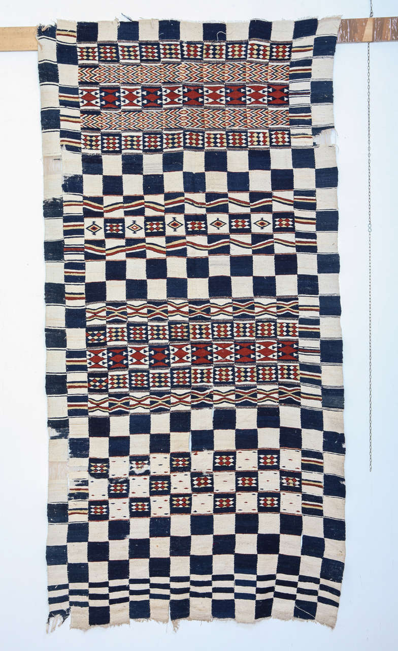 Named 'Arkilla', flatweaves such as this one were woven as part of the dowry and were used as bed covers by the west African people of Mali. Entirely woven in fine, handspun cotton, they represent one of the most refined expressions of African