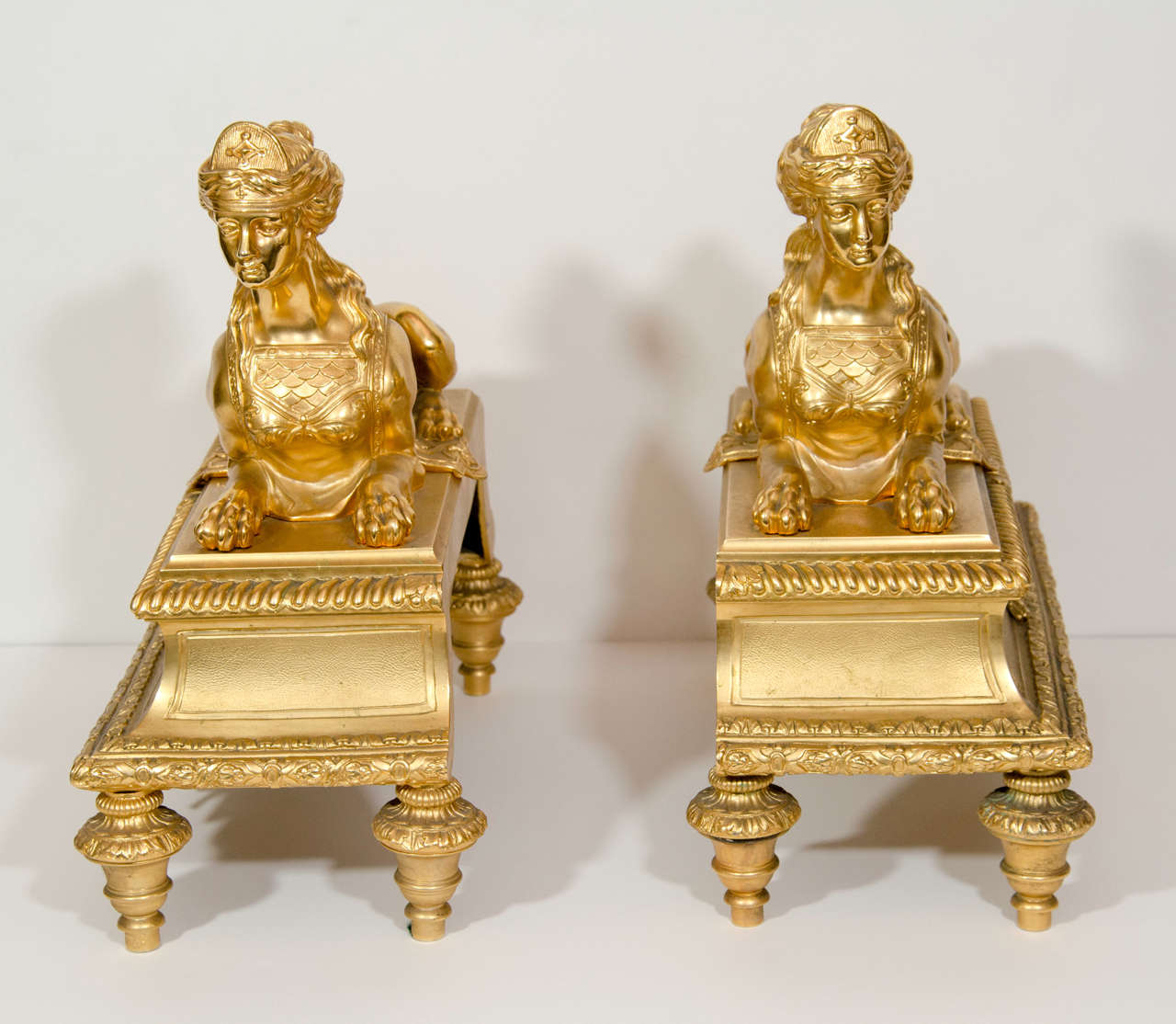 Pair of Rare & Large Antique French Louis XVI gilt bronze figural Andirons of fine quality embellished with reclining sphinxes, 19th Century.