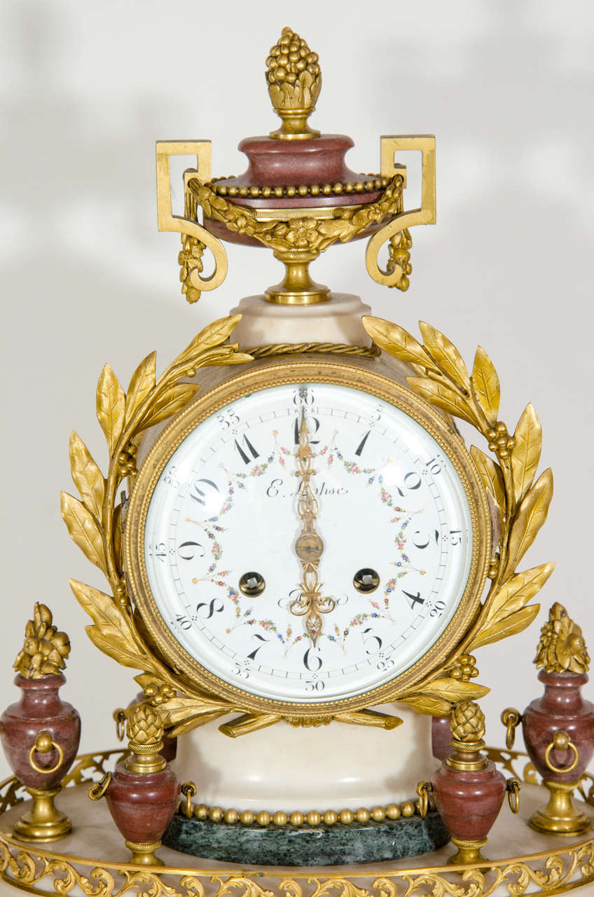 Gilt French 19th Century Louis XVI Style Marble and Ormolu Clock, By E. Lemoine For Sale