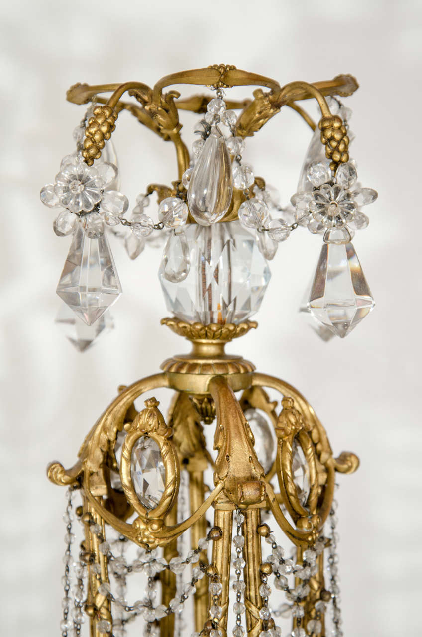 Pair of Antique French Louis XVI Style Gilt Bronze and Crystal Candelabra Lamps In Good Condition In New York, NY