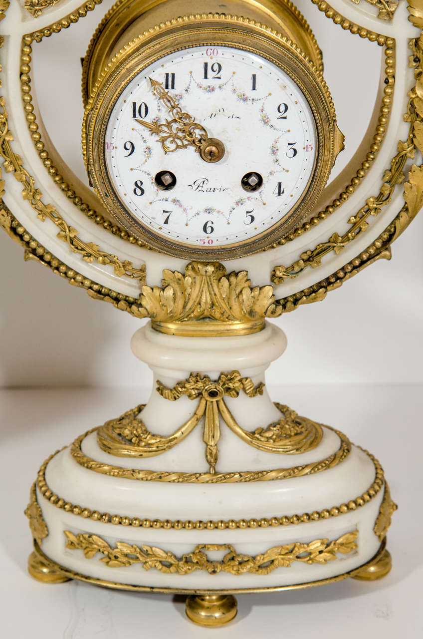 Antique French Louis XVI Style Gilt Bronze and White Marble Lyre Form Clock Set In Good Condition For Sale In New York, NY