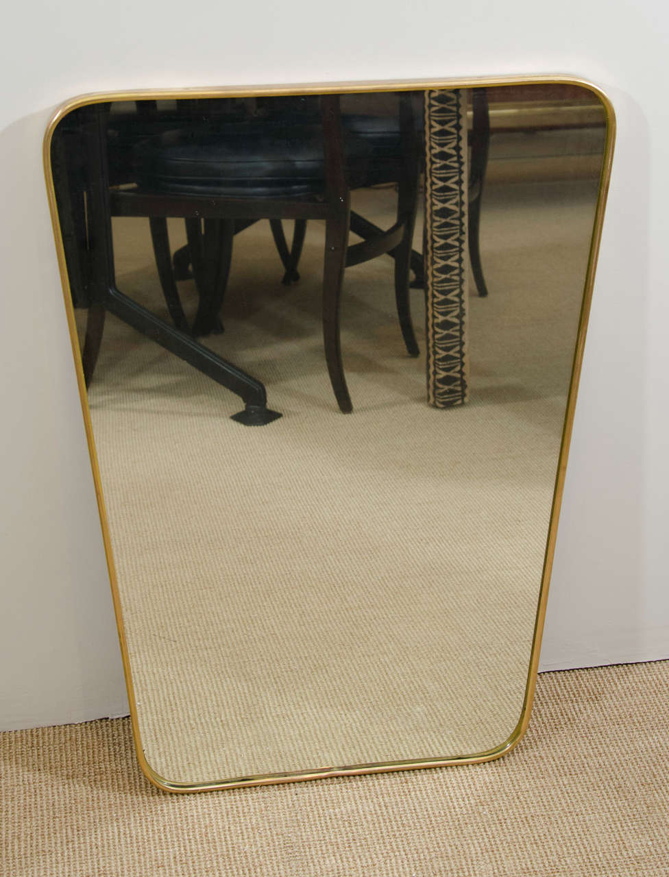 Italian modernist, 1950s brass framed mirror.