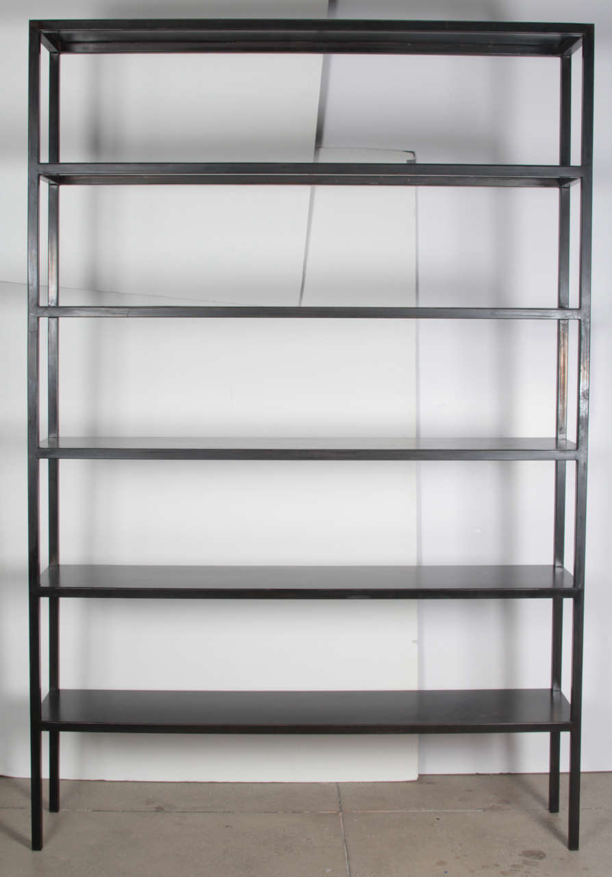 Custom black steel bookcase. USA, 20th century.  This item is special order.  Made in the USA.  Available in the followings sizes and also in custom dimensions. Contact us for custom size quote; please allow 3 to 4 weeks for delivery.

Large (as