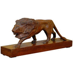 Carved Lion on Wood Base circa 1940