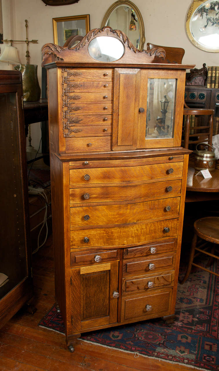 If you want to have fun with a cabinet, you can't do better than this.  Believe it or not, dentists used this in their office to store their drill bits, tools, and other accoutrements.  Drawers swivel, pull out, and have all sorts of interesting