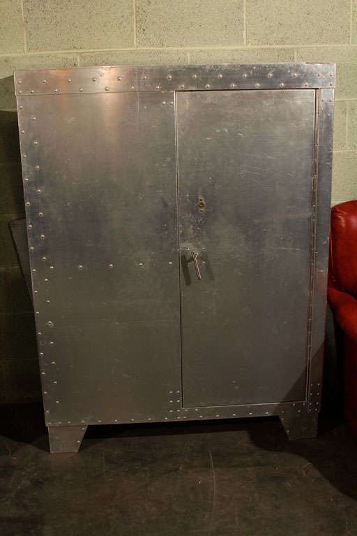 Industrial aluminum navy cabinet, opens on one side