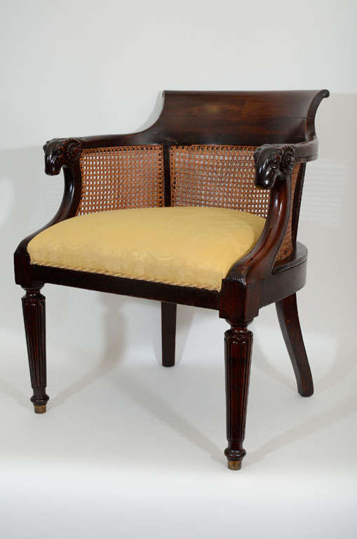 Mahogany Barrel Back Caned Desk Chair with Ram's Head Motif Arms and Tapered, Carved Front Legs.  19th Century<br />
<br />
24 inches wide x 20 inches deep x 30 inches high
