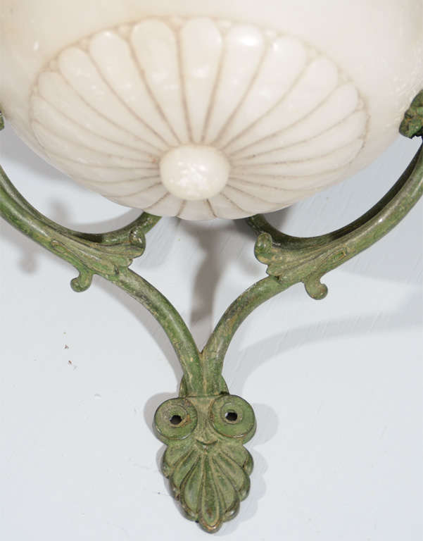 Pair of French Alabaster and Patina Metal Sconces In Good Condition In New York, NY