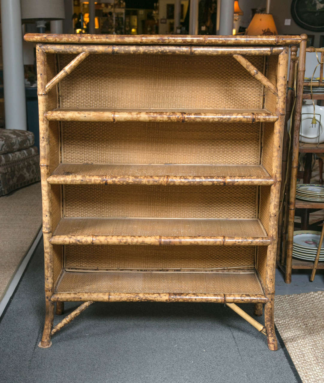 Charming bamboo bookcase with four shelves.