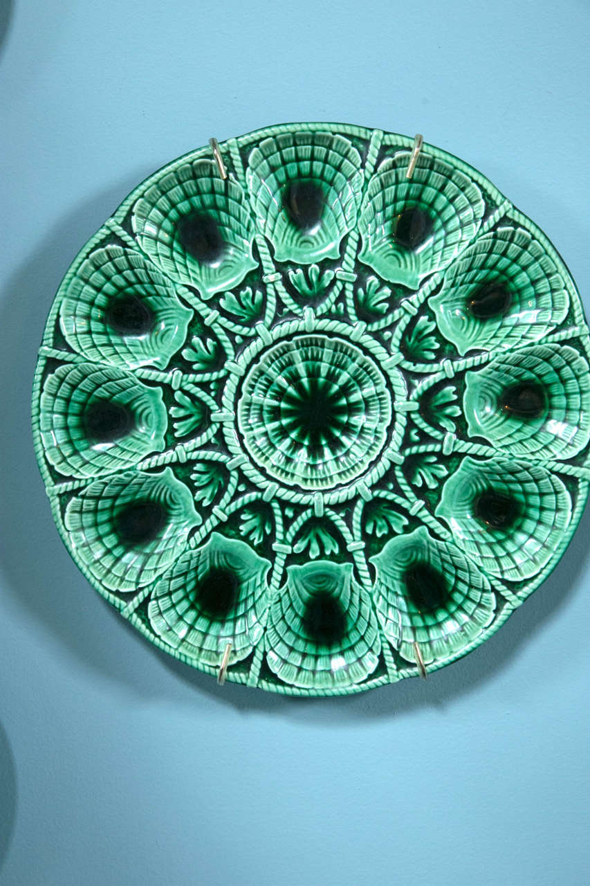 One green glazed Sarreguemines serving plate for oysters.