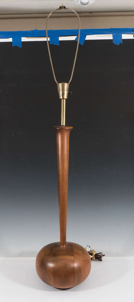  Modernistic table lamps in hand carved, patchwork wood, produced 1970s by Phillip Lloyd Powell, in the form of gourds with elongated stems, above round bases. Wiring and sockets to US standard, with brass hardware, each requiring one Edison base
