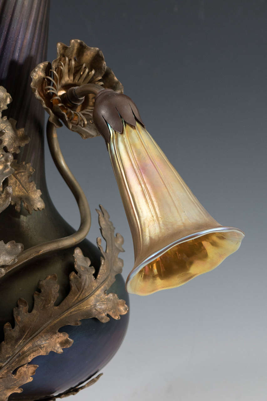 Early 20th Century  Amazing Bronze Austrian Art Nouveau Vase Form Lamp with Lily Light Shades For Sale