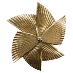 A Curtis Jere Brass Pinwheel Wall Sculpture