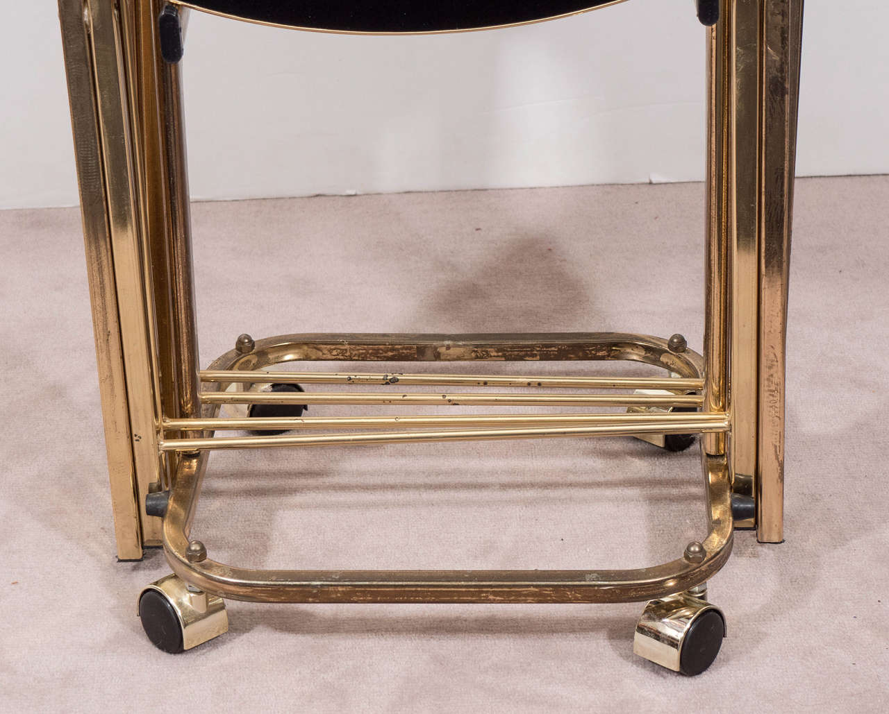 Set of Four Hollywood Regency Brass Frame Dinner Trays with Black Glass Tops 1