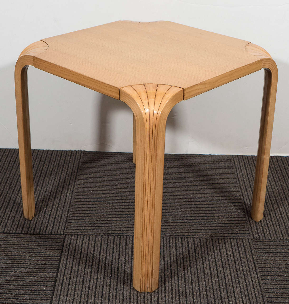 A vintage birch wood side table on 'fan legs,' 23 by Finnish designer Alvar Aalto, circa 1960s for ICF Group. Markings include original label [ICF], underneath the table top. Very good vintage condition with age appropriate wear.