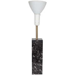 A Nessen Studio Black Marble Table Lamp with Milk Glass Shade