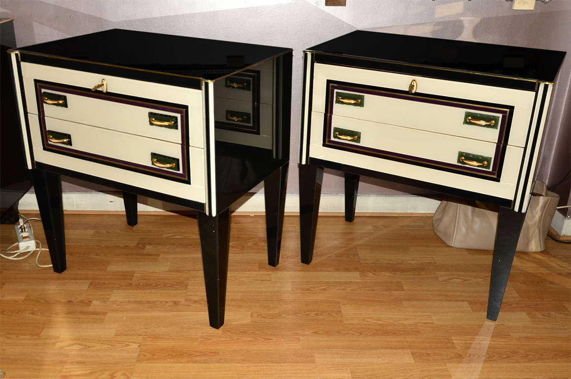 Pair of commodes all in black and beige mirror.
