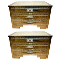 Pair of commodes in mirror.