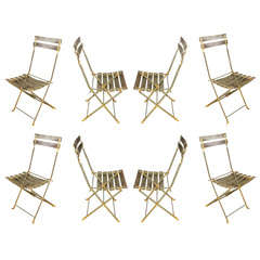 Set of 8 folding. chairs in Plexiglass.
