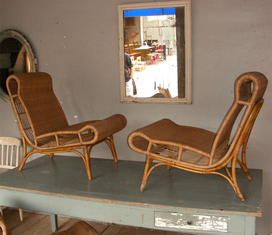 Four wood and bamboo fireside chairs, deep and wide. All original materials