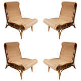 Set of Four Wood and Bamboo chairs by Louis Sognot