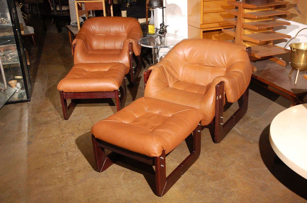 Two pair of chairs and ottomans by Percival Lafer leather/jacara