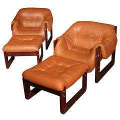 Two pair of chairs and ottomans by Percival Lafer leather/jacara