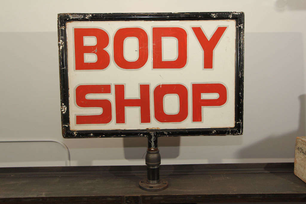 Most likely created to advertise auto body repair, this double-sided hand-painted sign would be wonderful in a home gym.