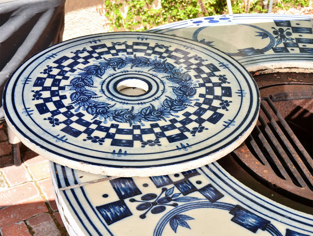 a hibachi table with blue and white hand-painted ceramic tiles. 
24 Rosenthal 