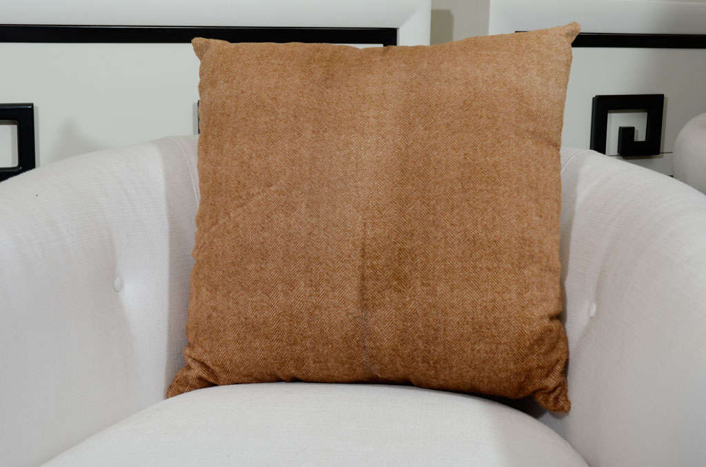 Tan herringbone stenciled cowhide pillows with cashmere lining