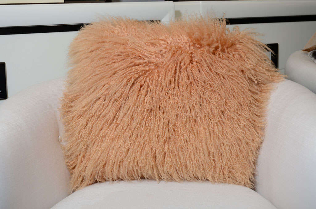 Custom made genuine mongolian lamb pillows in apricot with cashmere backing