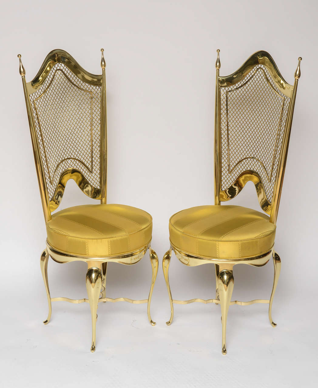WOW, prettier in person but you can observe the amazing details about these side chairs:  polished brass throughout, lattice back, detailed finials and silk fabric seat.