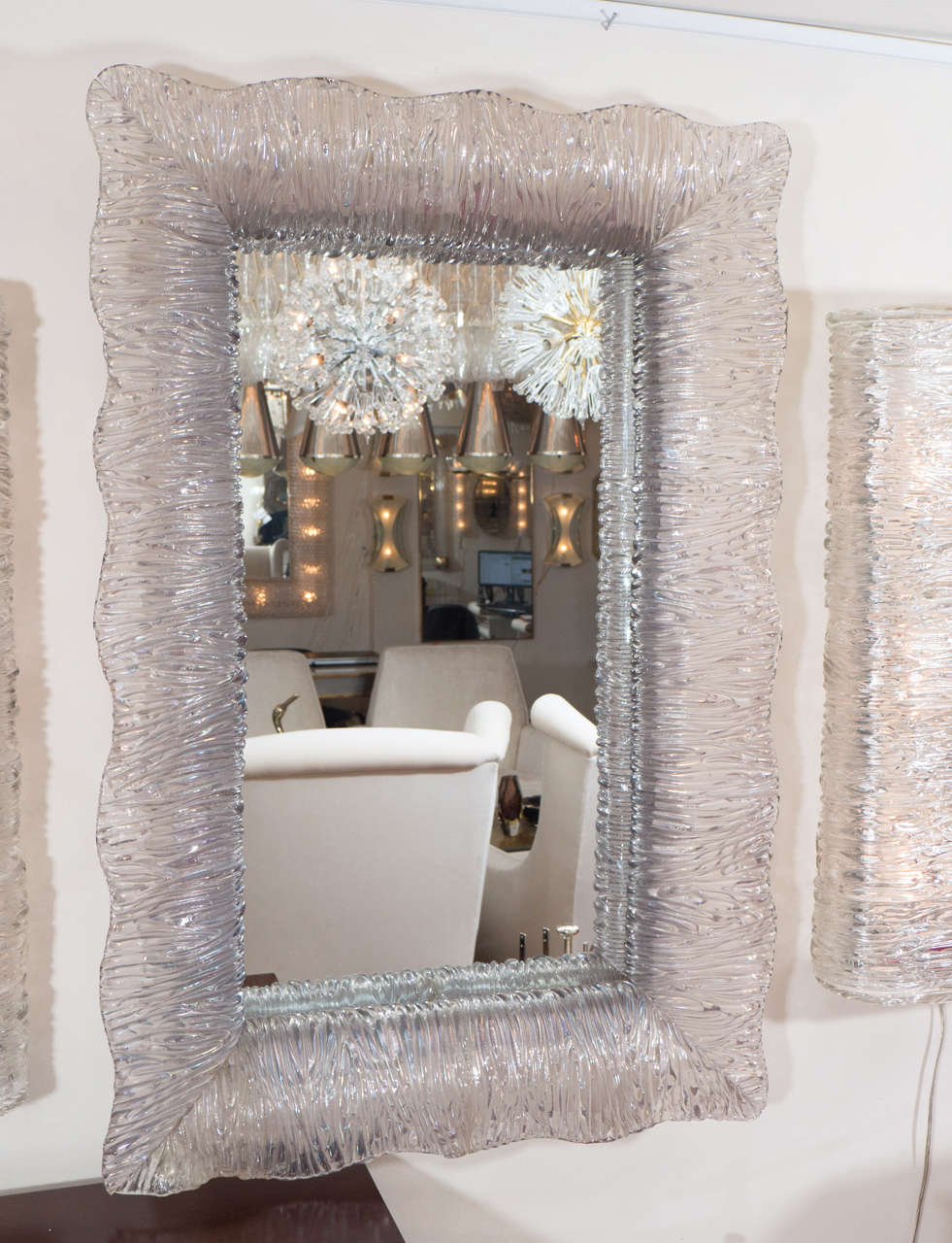 Rectangular mirror with iridescent fluted and curved glass surround by Barovier.