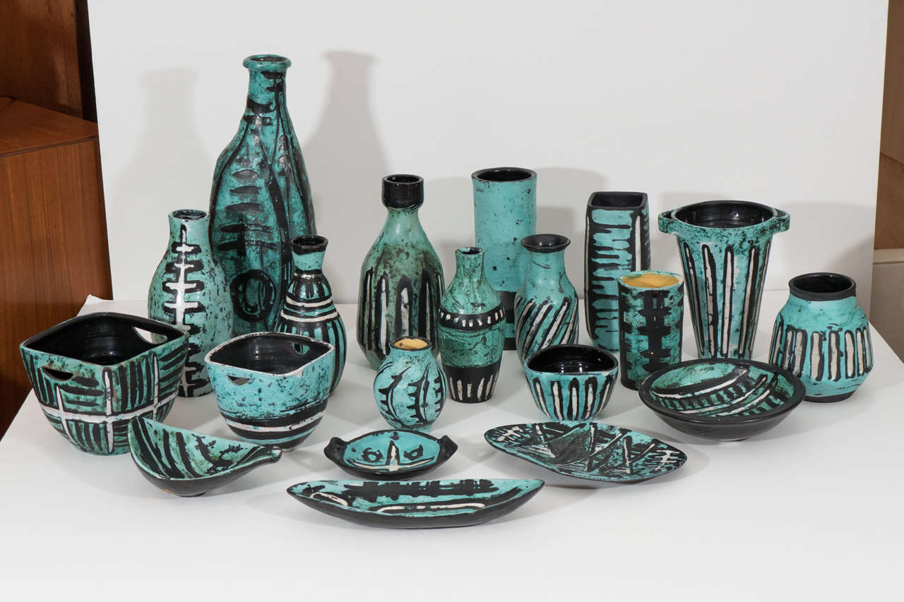All are hand signed. 
Heights of these 20 turquoise ceramics range from 1 1/2